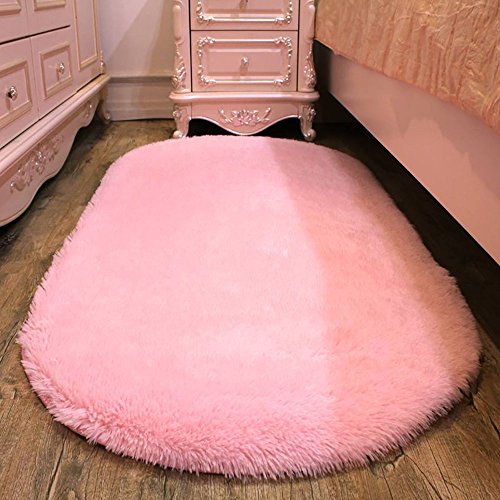 Tapis rose ovale pour chambre de fille